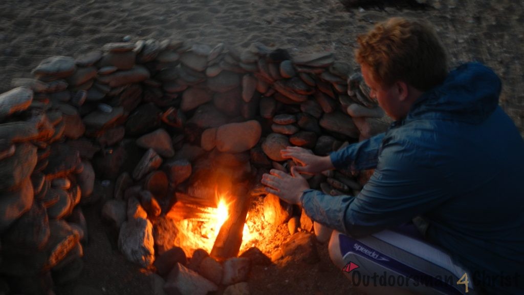 warming up by the fire