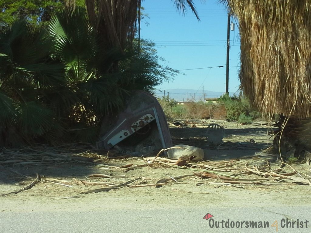 half buried boat